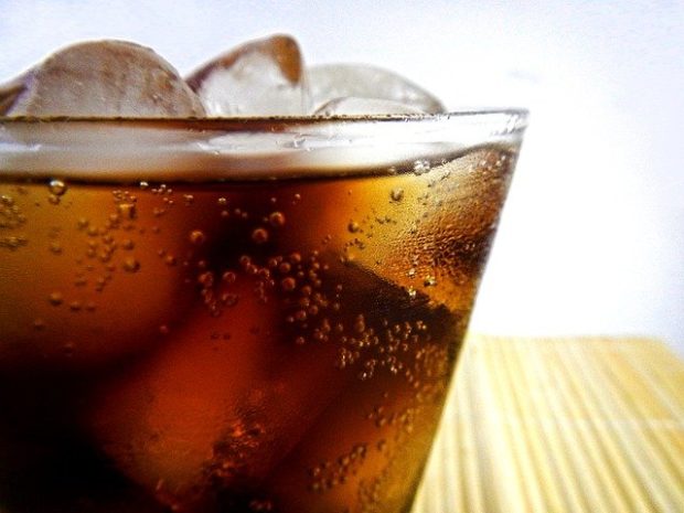 A glass of cola with ice.
